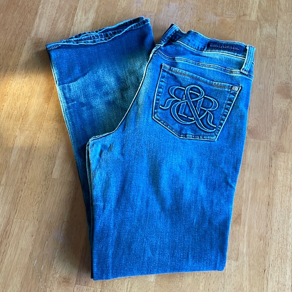 Woman’s Rock and Republic boot cut jeans.